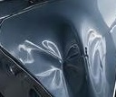Panel with a crease dent